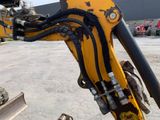 a close up view of a machine that is on the ground
