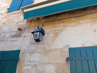 a light that is on the side of a building