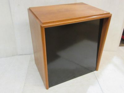 a small wooden box with a black door on it