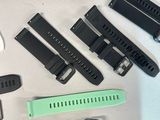 a lot of different types of watches on the table