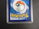 a close up of a pokemon trading card in a plastic holder