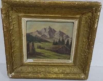une image d'un tableau représentant une scène de montagne dans un cadre doré