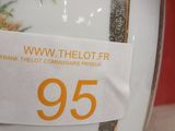 a close up of a vase with a price tag on it