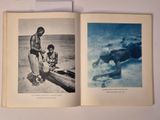 an open book with two pictures of a man and a child