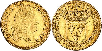 une pièce souveraine en or surmontée d'une couronne