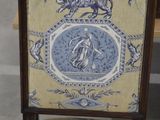 a chair that has a blue and white design on it