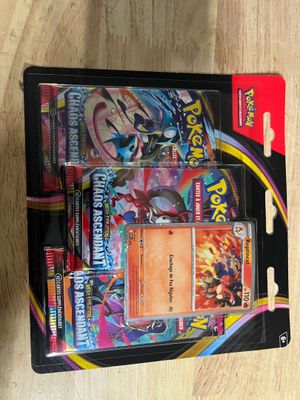 a box of pokemon cards sitting on a table