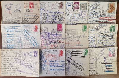 many different types of postcards on the table
