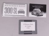 a picture of a picture of a car and a book on a table