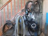 a pile of wires and other electrical equipment on the floor