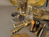 a lot of silver items that are on a table