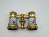 pair of antique gold - plated binoculars with miniature paintings on them