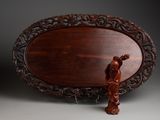 an image of a wooden plaque with a bird on it