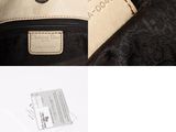 an image of a black and white bag with a tag