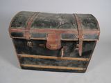 an old trunk that is sitting on a table