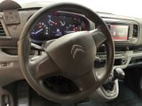 dashboard of a car with a steering wheel and dashboard lights