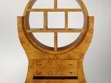 an image of a wooden cabinet with a mirror on top of it