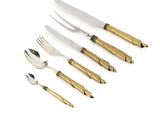 a set of four forks and spoons with gold handles