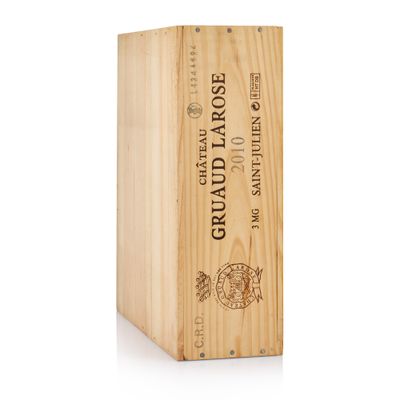 a wooden box with a bottle of wine in it on a white background