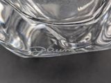 a close up of a glass of water on a table