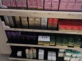 a lot of different types of skin care products on the shelves