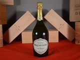 a bottle of wine that is sitting on a table