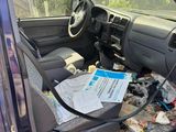 a car that has a bunch of trash in it