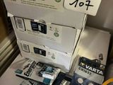 a stack of electronics sitting on top of a table