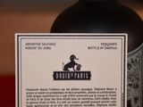 a label on a bottle of wine on a table