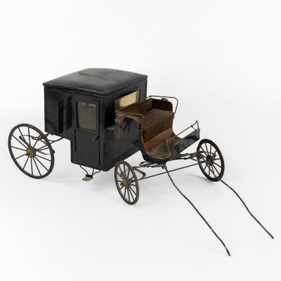 une calèche à l'ancienne sur fond blanc
