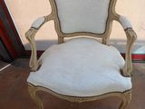 an image of a chair with a white upholstered seat