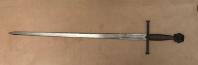 a knife that is laying on top of a table