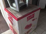 a stack of chairs that are on top of a box