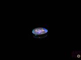 l'image d'un disque dans l'obscurité, sur fond noir