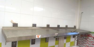 an image of a commercial kitchen with stainless steel counter tops
