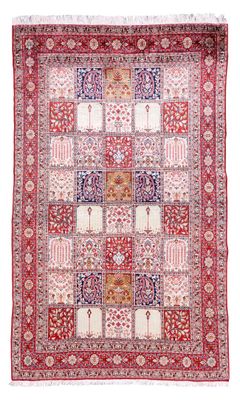 un tapis rouge et blanc orné d'un motif en patchwork