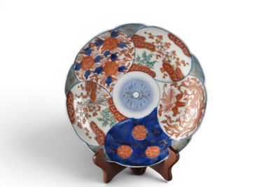 a plate that has a blue and orange design on it