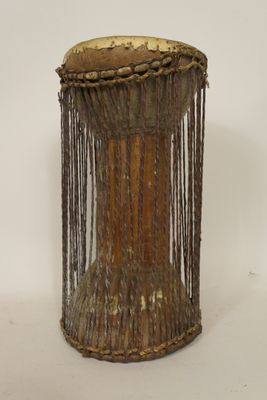 a small wooden drum with a chain around it