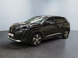 a black car parked in a room with a black floor