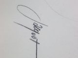 someone is writing a name on a piece of paper with a pencil
