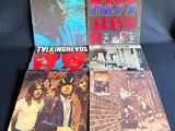 three books of kiss alive and talking heads, including the band ' s first album