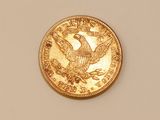 an image of a gold coin with an eagle on it