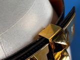 a close up of a belt on a mannequin mannequin