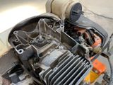 a small engine that is sitting on the ground