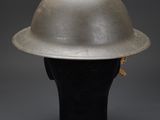 a silver helmet on a mannequin head