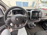 the interior of a car with a steering wheel and dashboard controls