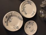 three plates that are sitting on a table