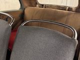 two seats in the back of a car that is empty