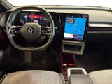 a picture of the interior of a car with a touch screen