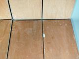 a picture of a wooden floor in a bathroom